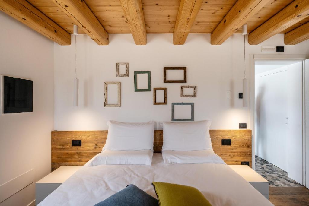 Postel nebo postele na pokoji v ubytování Borgo Paolin - Camere in vigna