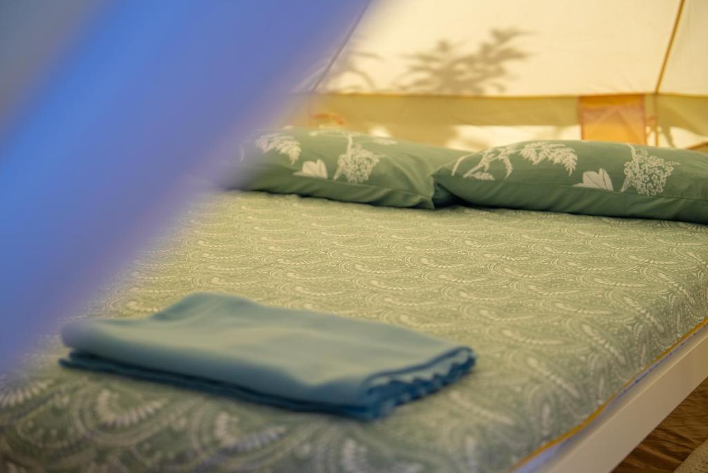 Postel nebo postele na pokoji v ubytování Glamping Di Palma