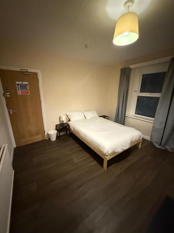 Postel nebo postele na pokoji v ubytování The Phoenix Inn