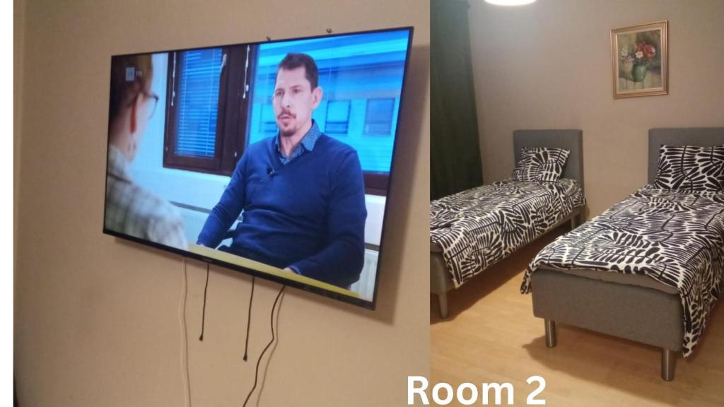 TV a/nebo společenská místnost v ubytování City Center Haven Across Turku Railway Station