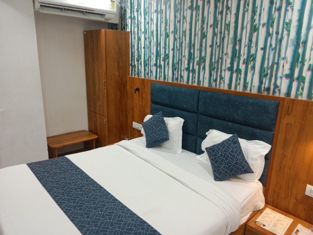 Postel nebo postele na pokoji v ubytování Hotel Lemon Gota