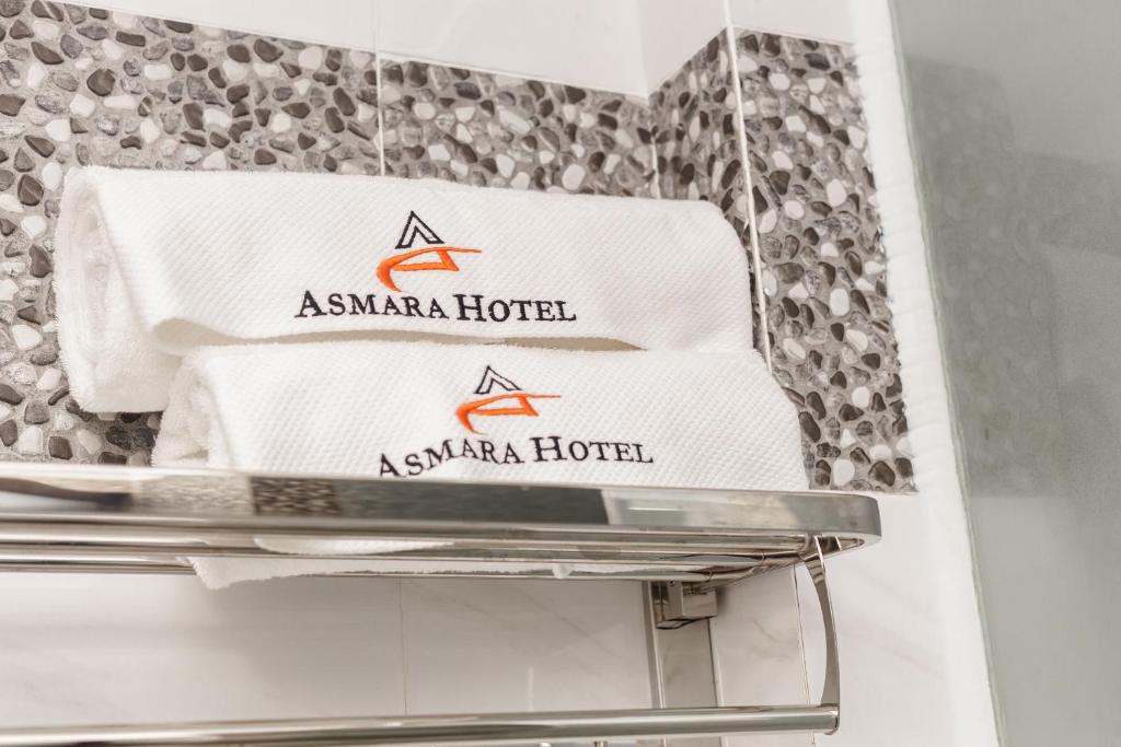 Certifikát, hodnocení, plakát nebo jiný dokument vystavený v ubytování Asmara Hotel