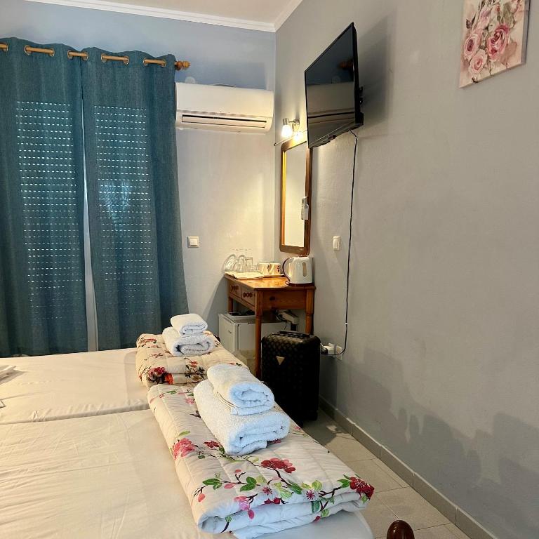 Postel nebo postele na pokoji v ubytování Hotel Lenox