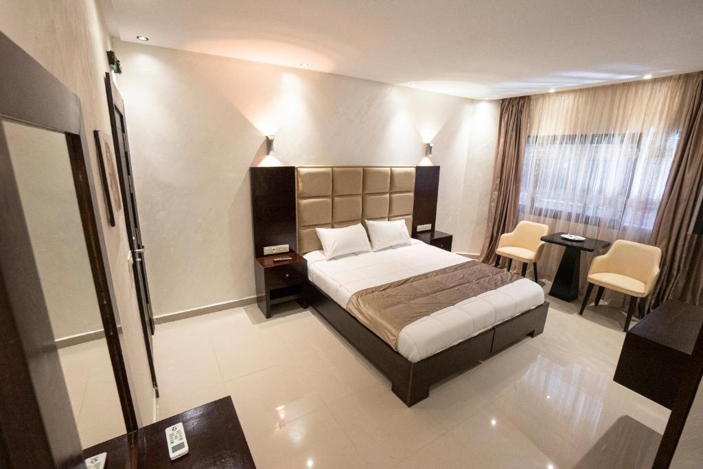 Postel nebo postele na pokoji v ubytování Hotel nord kap