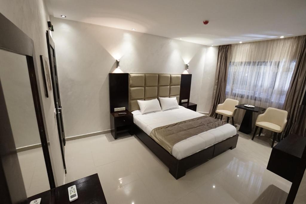 Postel nebo postele na pokoji v ubytování Hotel nord kap