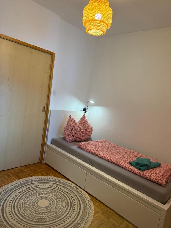 Postel nebo postele na pokoji v ubytování Appartment Scharleralm