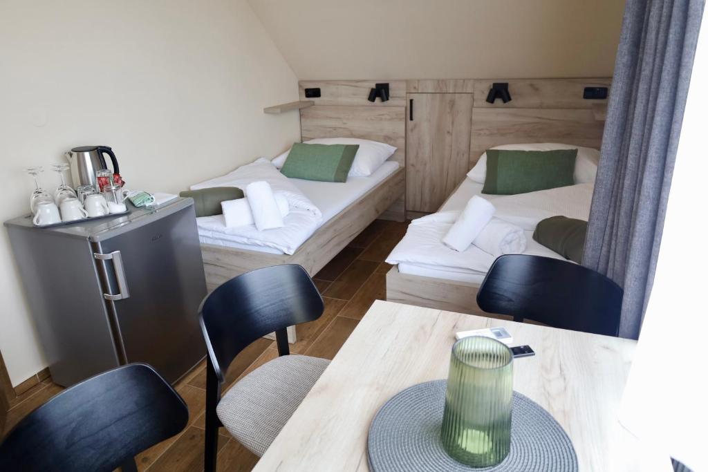 Postel nebo postele na pokoji v ubytování Ubytování U Pupka