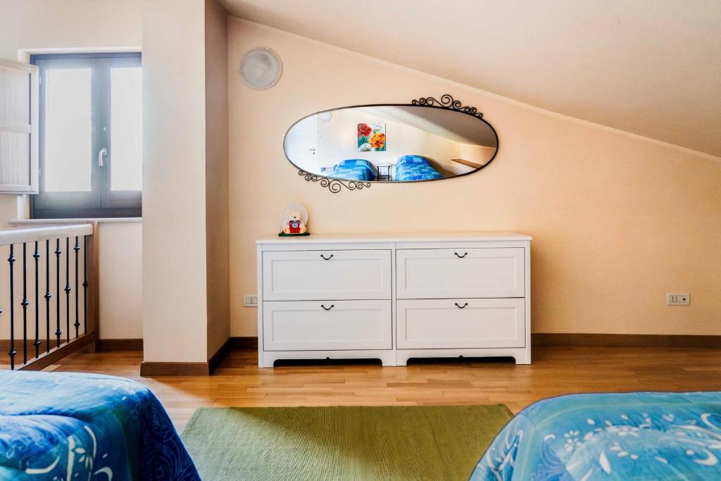 Postel nebo postele na pokoji v ubytování B&B La Casa Di Tocco