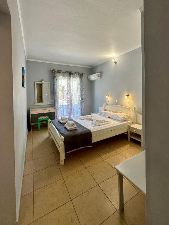 Postel nebo postele na pokoji v ubytování Hotel Lenox