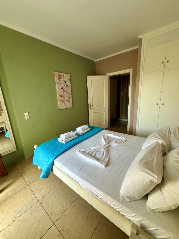 Postel nebo postele na pokoji v ubytování Hotel Lenox