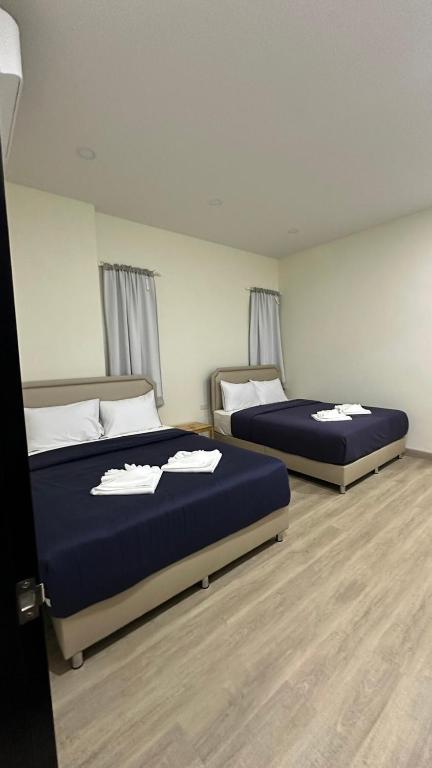 Postel nebo postele na pokoji v ubytování Casa Ricca Pool Villa Khaoyai