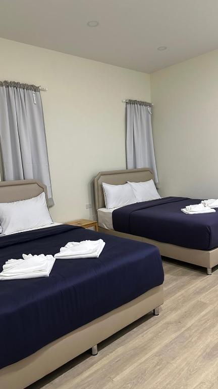 Postel nebo postele na pokoji v ubytování Casa Ricca Pool Villa Khaoyai