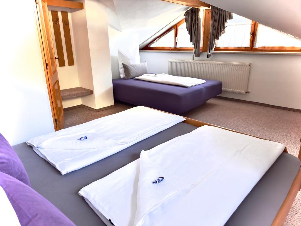 Posteľ alebo postele v izbe v ubytovaní Ferienwohnung Vesna & Alex