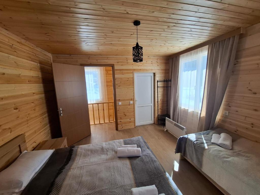 Postel nebo postele na pokoji v ubytování Mountain house in Mestia