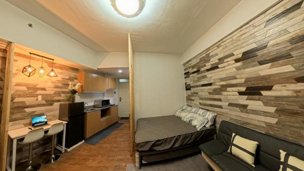 Kuchyň nebo kuchyňský kout v ubytování Mactan Cozy Hub Amani Grand
