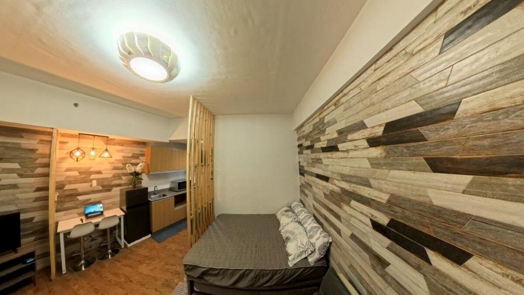 Kuchyň nebo kuchyňský kout v ubytování Mactan Cozy Hub Amani Grand