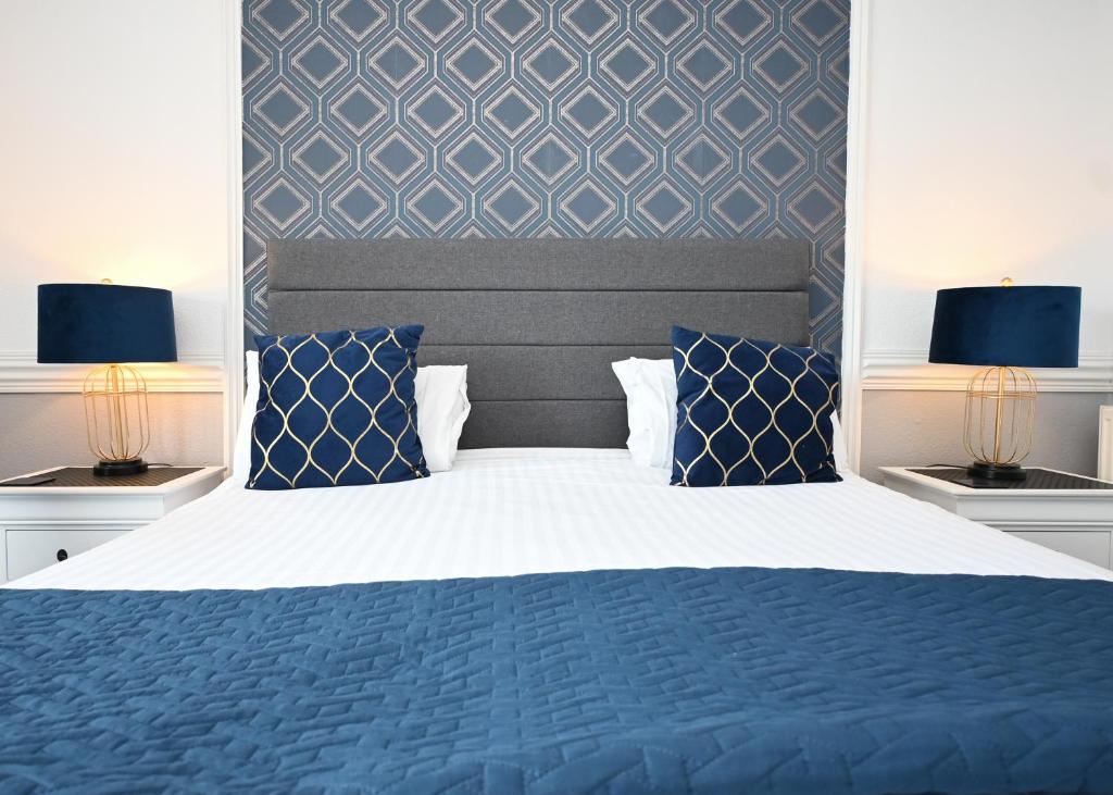Ein Bett oder Betten in einem Zimmer der Unterkunft MacKays