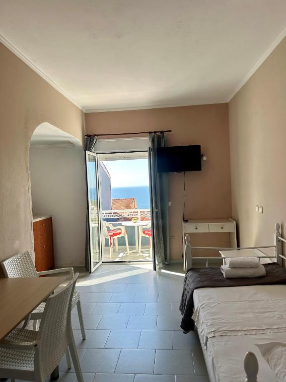 Postel nebo postele na pokoji v ubytování Hotel Lenox