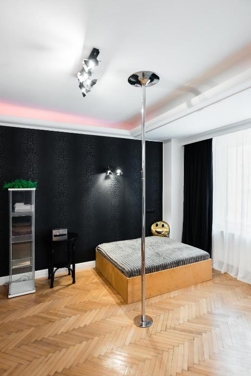 Postel nebo postele na pokoji v ubytování Bucharest Studios Berlin Room