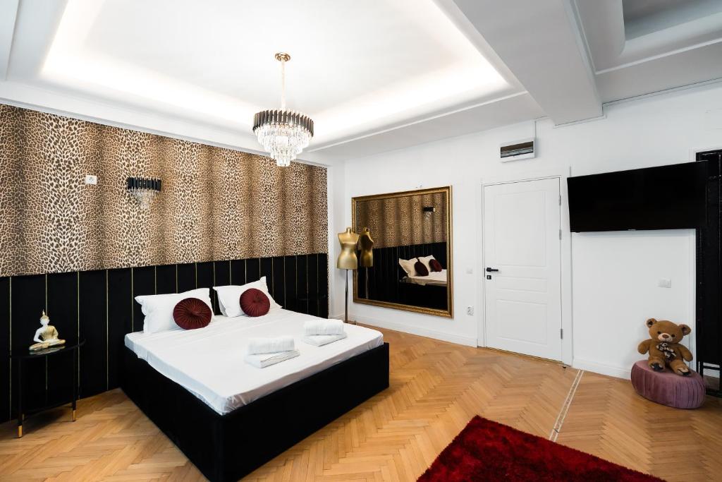 Postel nebo postele na pokoji v ubytování Bucharest Studios Berlin Room