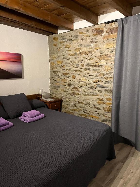 Llit o llits en una habitació de Hostal Rusó SC