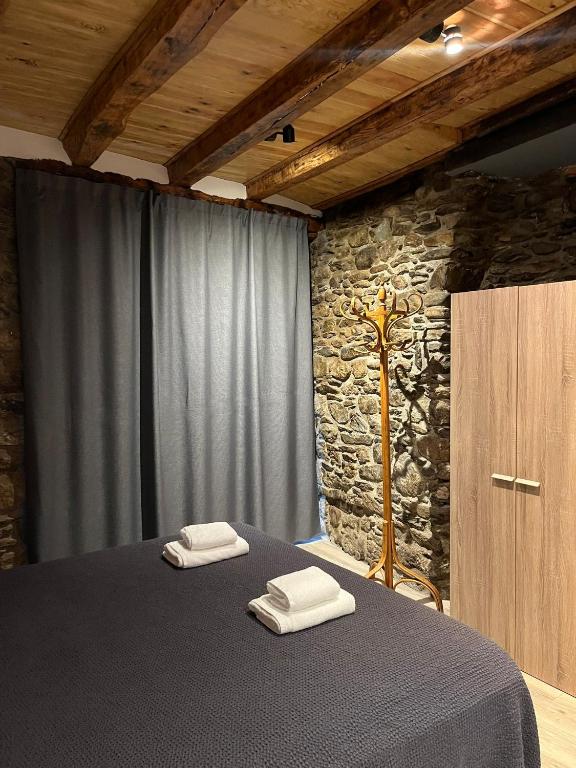 Llit o llits en una habitació de Hostal Rusó SC