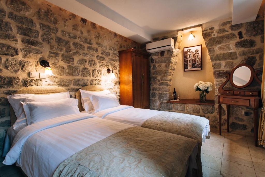 Postel nebo postele na pokoji v ubytování Hotel Galathea