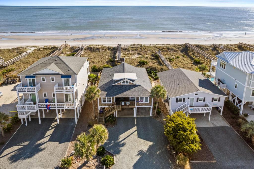 an aerial view of a house and the beach at Ocean Front 3 Bedroom 2 Bath Home, Pet Friendly in Ocean Isle Beach