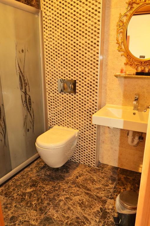 Koupelna v ubytování Hotel Yonca
