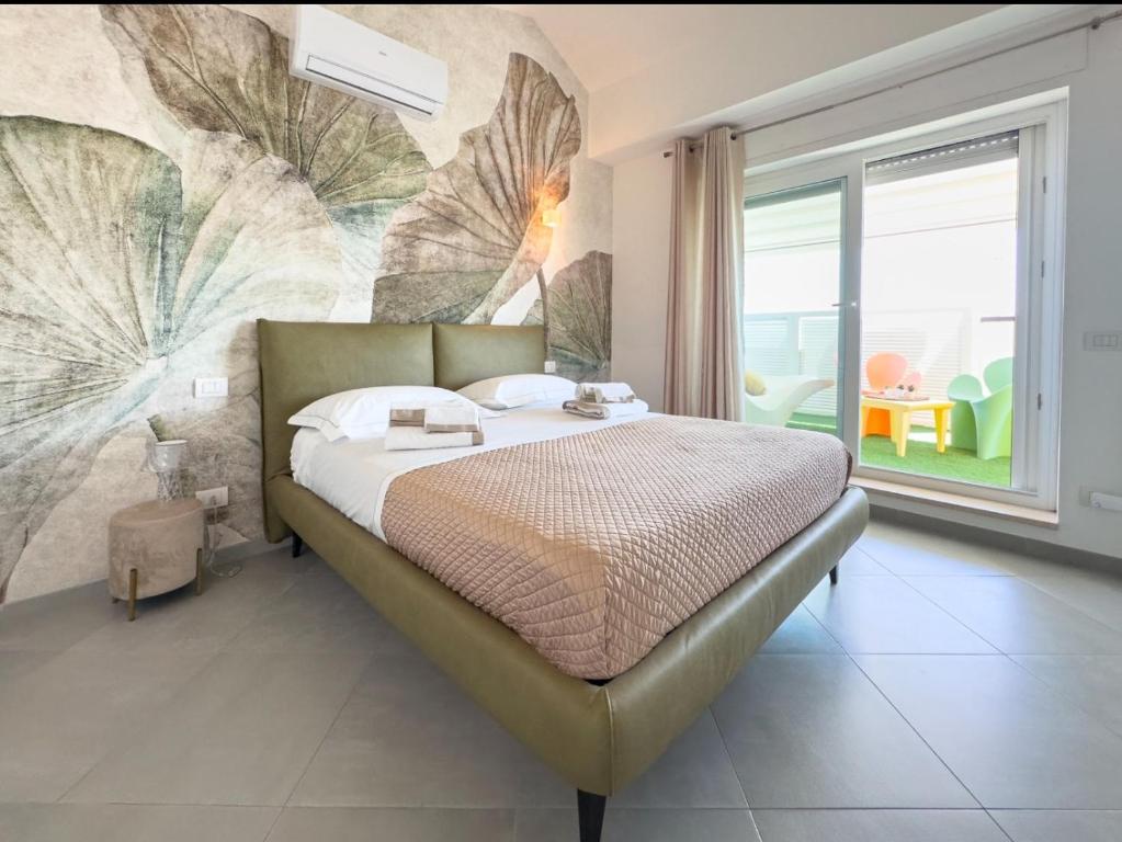 Letto o letti in una camera di B&B ALLA NIVIERA