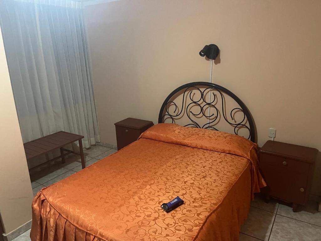 Postel nebo postele na pokoji v ubytování Mi casa Tacna