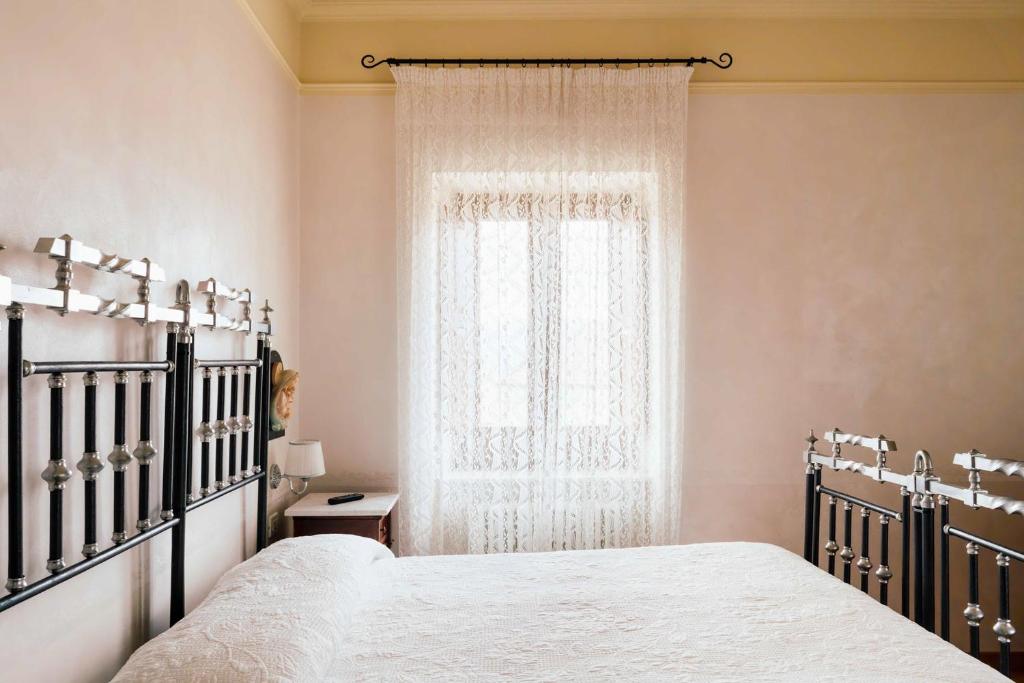 Postel nebo postele na pokoji v ubytování B&B La Casa Di Tocco
