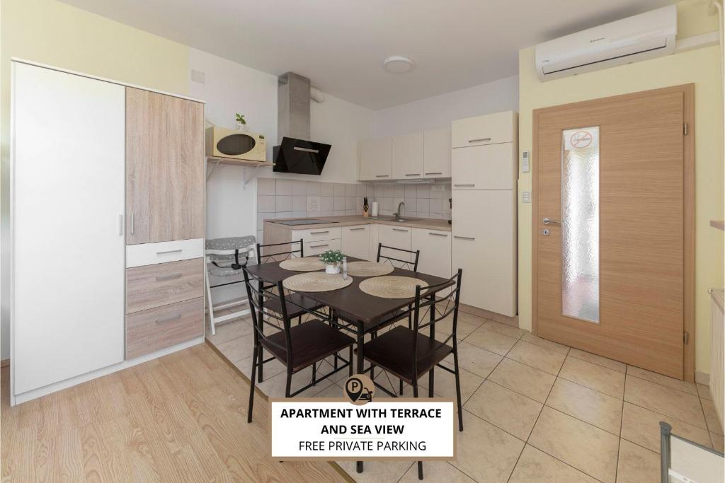 Kuchyň nebo kuchyňský kout v ubytování Apartma Vesna