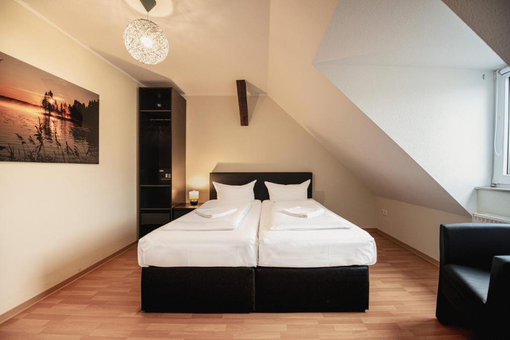 Postel nebo postele na pokoji v ubytování Wandery Hostel Dessau