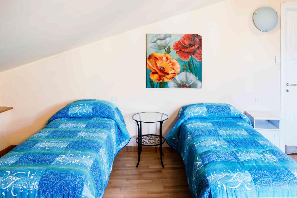 Postel nebo postele na pokoji v ubytování B&B La Casa Di Tocco