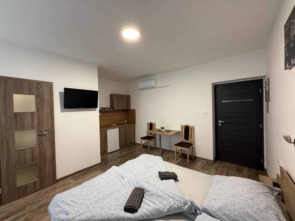 Postel nebo postele na pokoji v ubytování Apartmán Tereza