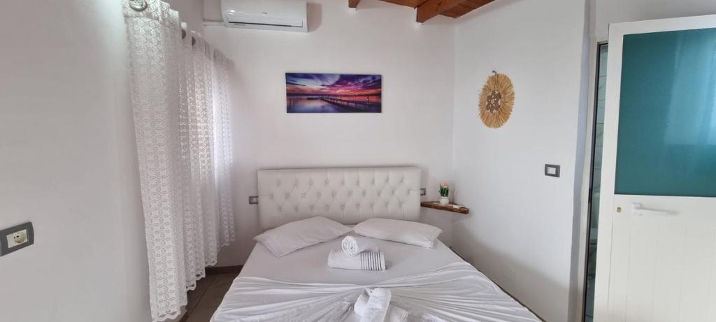 Postel nebo postele na pokoji v ubytování Hotel Restorant Olti