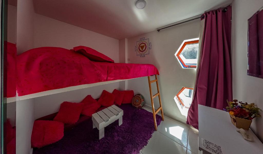 Postel nebo postele na pokoji v ubytování Mandala Yoga Hostel