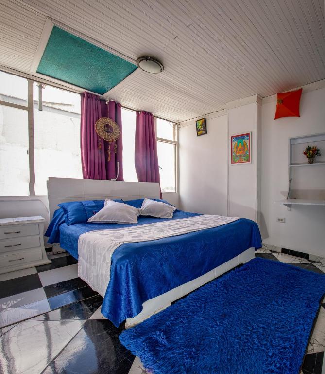 Postel nebo postele na pokoji v ubytování Mandala Yoga Hostel