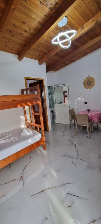Postel nebo postele na pokoji v ubytování Hotel Restorant Olti