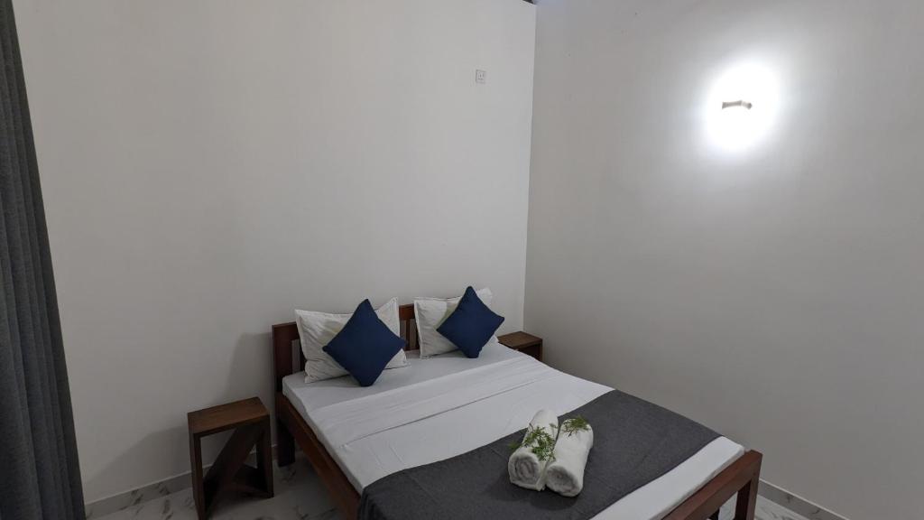 Postel nebo postele na pokoji v ubytování Bellezza Home stay
