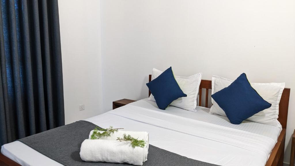 Postel nebo postele na pokoji v ubytování Bellezza Home stay