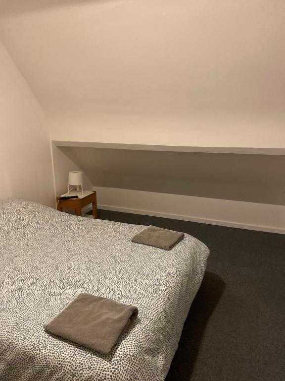 Postel nebo postele na pokoji v ubytování Côté mer