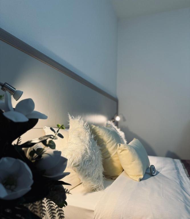 Postel nebo postele na pokoji v ubytování HOTEL LORENA