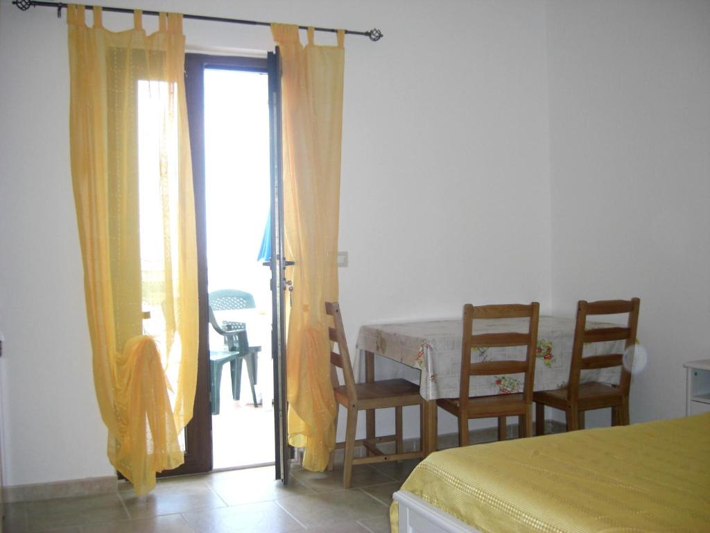 Postel nebo postele na pokoji v ubytování Agriturismoteo