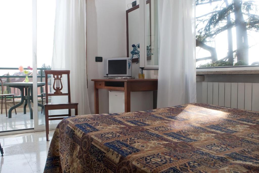 TV a/nebo společenská místnost v ubytování Hotel Antico Acquedotto
