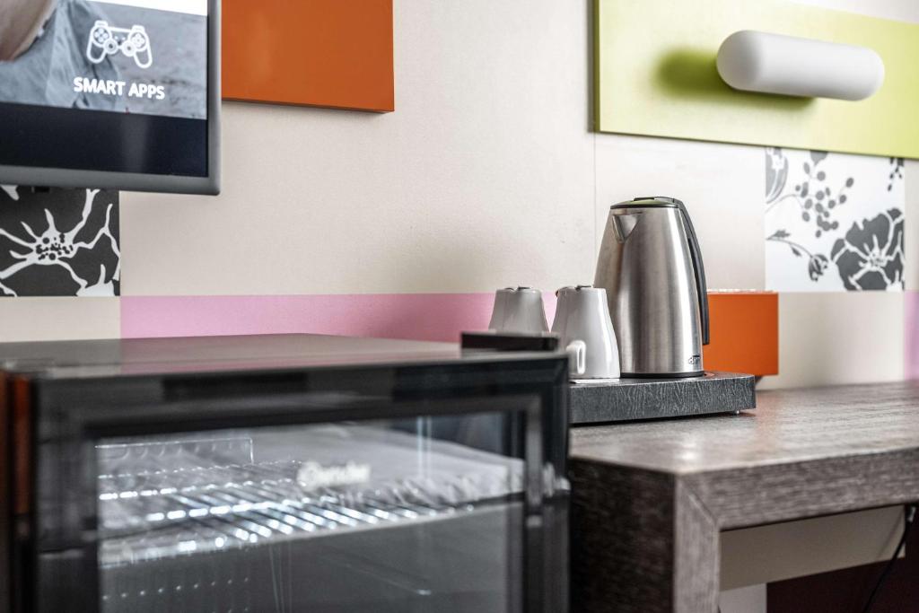 Příslušenství pro přípravu čaje a kávy v ubytování pentahotel Kassel