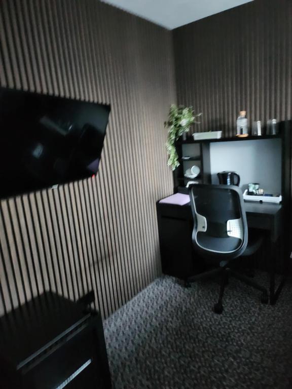TV a/nebo společenská místnost v ubytování Posyrooms