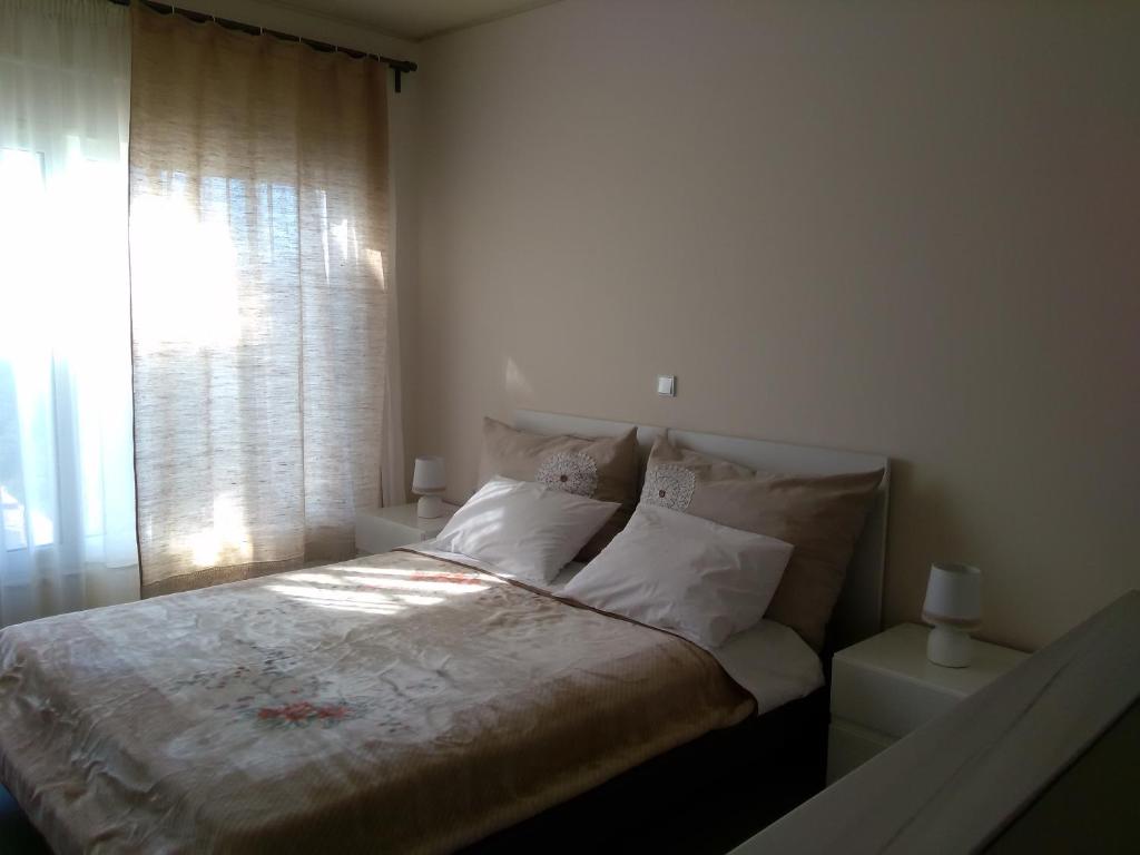 Posteľ alebo postele v izbe v ubytovaní Fevronia's Rooms