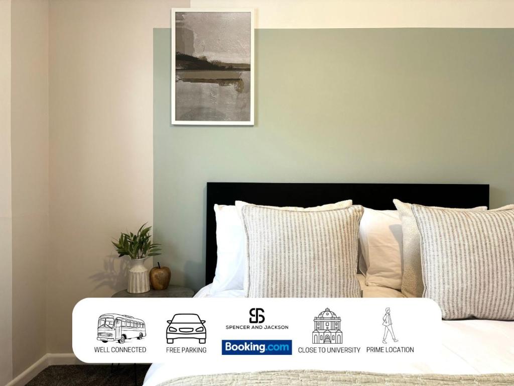 a bedroom with a bed with a black head board at 2 Bedroom Spacious Duplex with Free Parking Near The University - By Spencer & Jackson Short Lets & Serviced Accommodation Oxford in Oxford